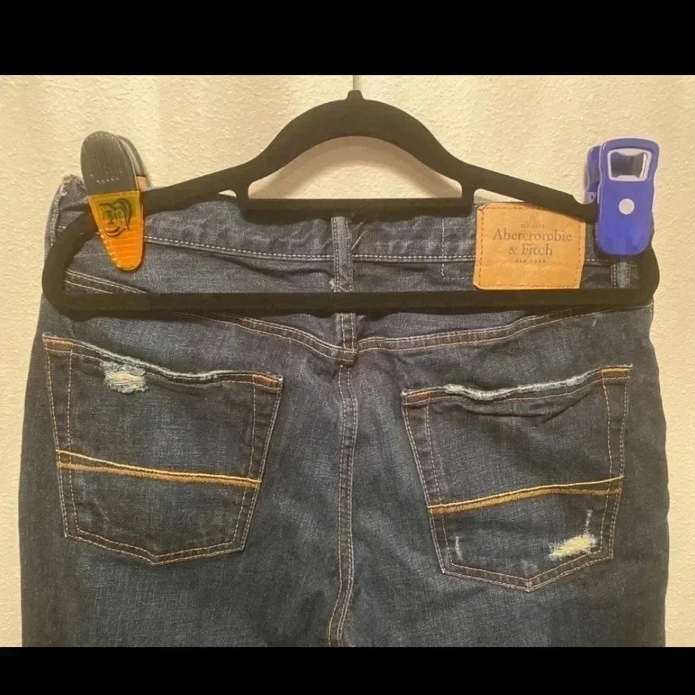 Abercrombie and Fitch jeans size 32/34. Distressed details‎  on front and back.